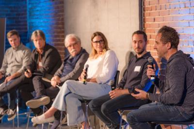 AI-NIMATION panel talking on stage